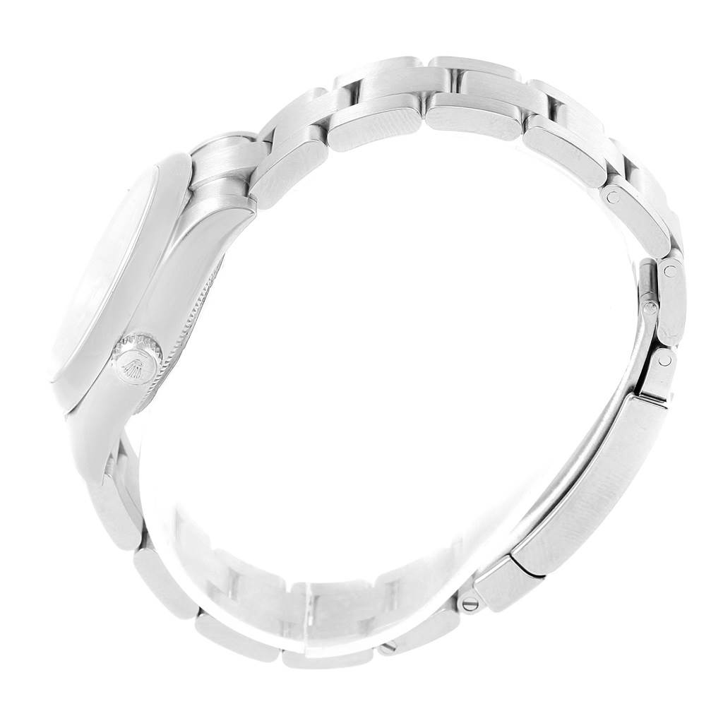 The image shows a side profile of a Mid-Size Rolex watch, highlighting its band and crown.