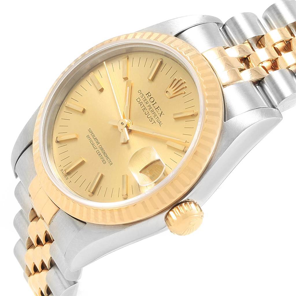 The image shows a side angle of a Rolex Mid-Size 68273 Women's Steel and Gold (two tone) Champagne Dial 68273 Women's Steel and Gold (two tone) Champagne Dial Datejust, highlighting the dial, crown, case, and bracelet.