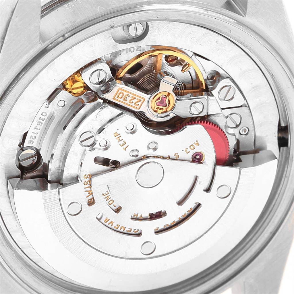 This image shows a close-up of the internal movement mechanism of a Rolex Mid-Size 77080 Women's Stainless Steel Blue Dial 77080 Women's Stainless Steel Blue Dial model watch.