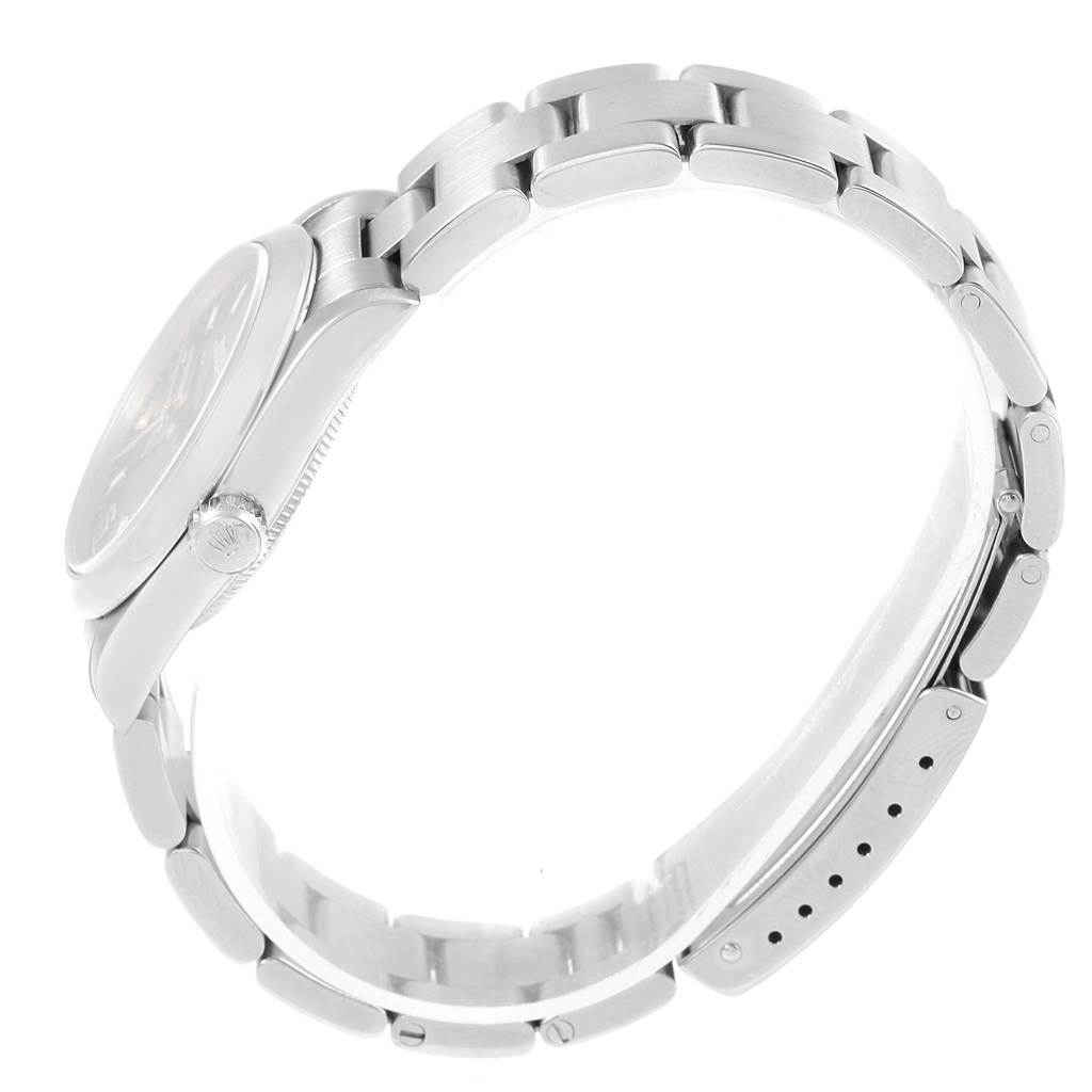 The Rolex Mid-Size 77080 Women's Stainless Steel Blue Dial 77080 Women's Stainless Steel Blue Dial watch is shown from a side angle, highlighting the case, crown, and bracelet.