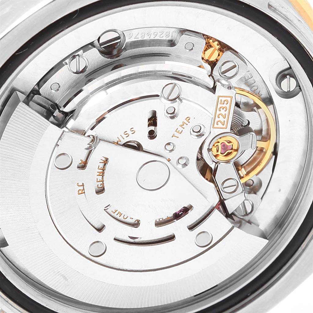 This image shows the detailed inner mechanism and movement parts of a Rolex Mid-Size 178383 Women's Steel and Gold (two tone) Silver Dial 178383 Women's Steel and Gold (two tone) Silver Dial model watch from a close-up angle.