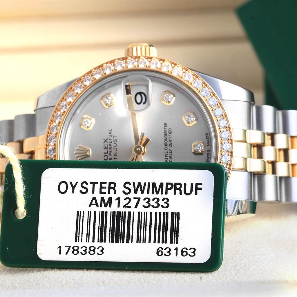 The image shows a close-up view of a Rolex Mid-Size 178383 Women's Steel and Gold (two tone) Silver Dial 178383 Women's Steel and Gold (two tone) Silver Dial model watch, focusing on the face, diamond bezel, and bracelet.