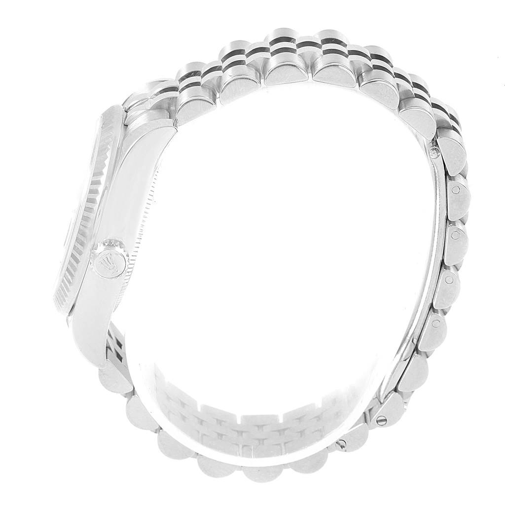 The image shows a Rolex Mid-Size 178274 Women's Stainless Steel Silver Dial 178274 Women's Stainless Steel Silver Dial watch from a side angle, highlighting the crown, bezel, and part of the bracelet.