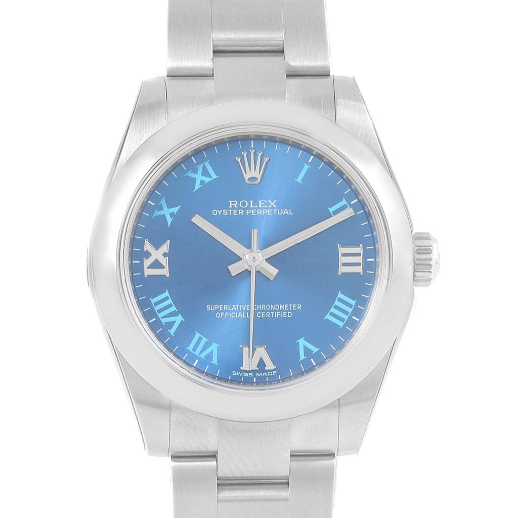 This image shows a front-facing view of a Rolex Oyster Perpetual Mid-Size watch with a blue dial and silver Roman numerals.