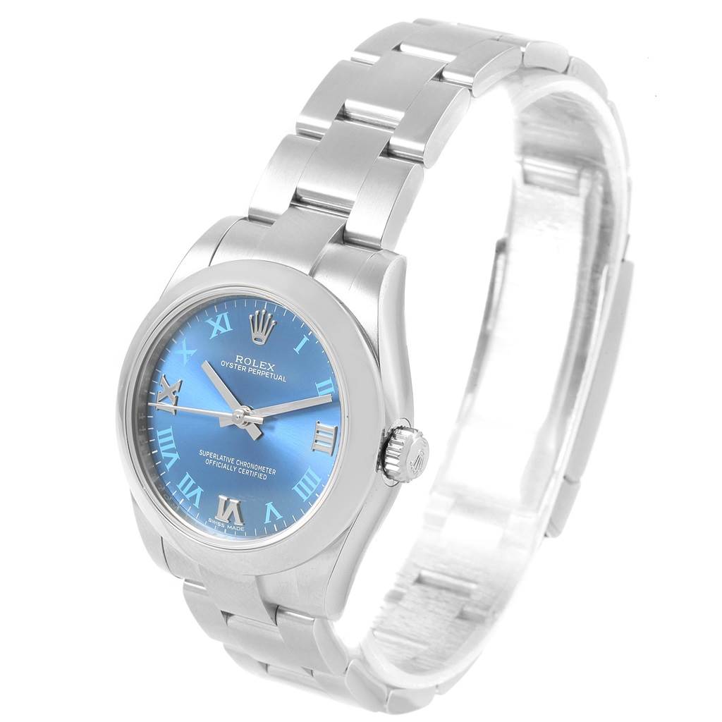 This picture shows a Rolex Mid-Size 177200 Women's Stainless Steel Blue Dial 177200 Women's Stainless Steel Blue Dial model from a slight side angle, displaying the dial, bezel, crown, and part of the bracelet.