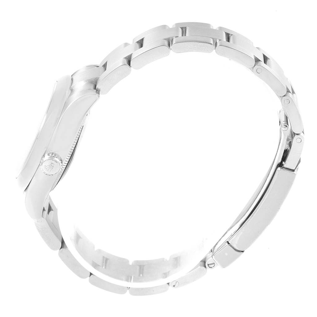 This image shows the right side profile and bracelet of a Mid-Size Rolex watch, highlighting the clasp and links.