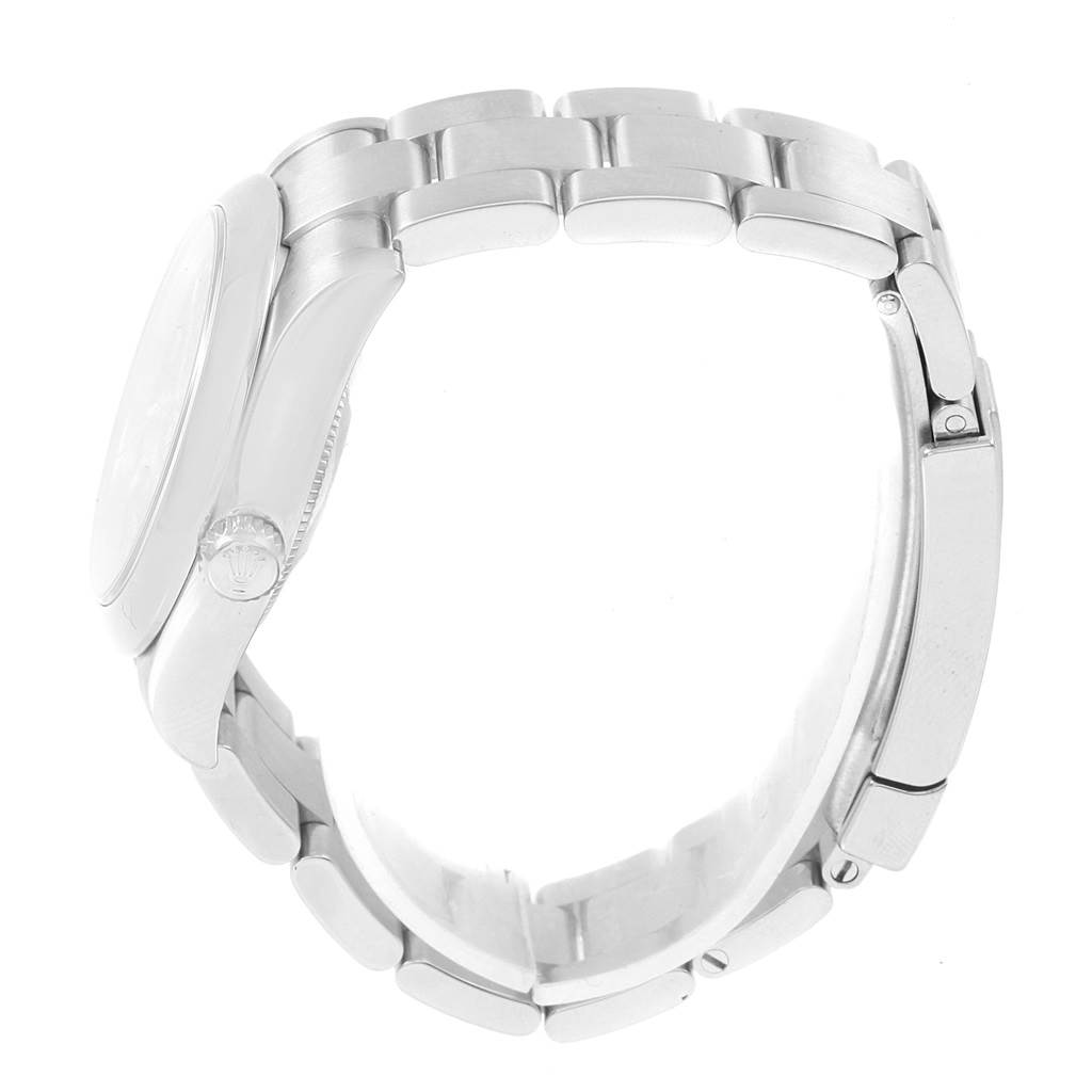 The image shows a side view of the Rolex Mid-Size 177200 Women's Stainless Steel Black Dial 177200 Women's Stainless Steel Black Dial model, highlighting its bracelet and crown.