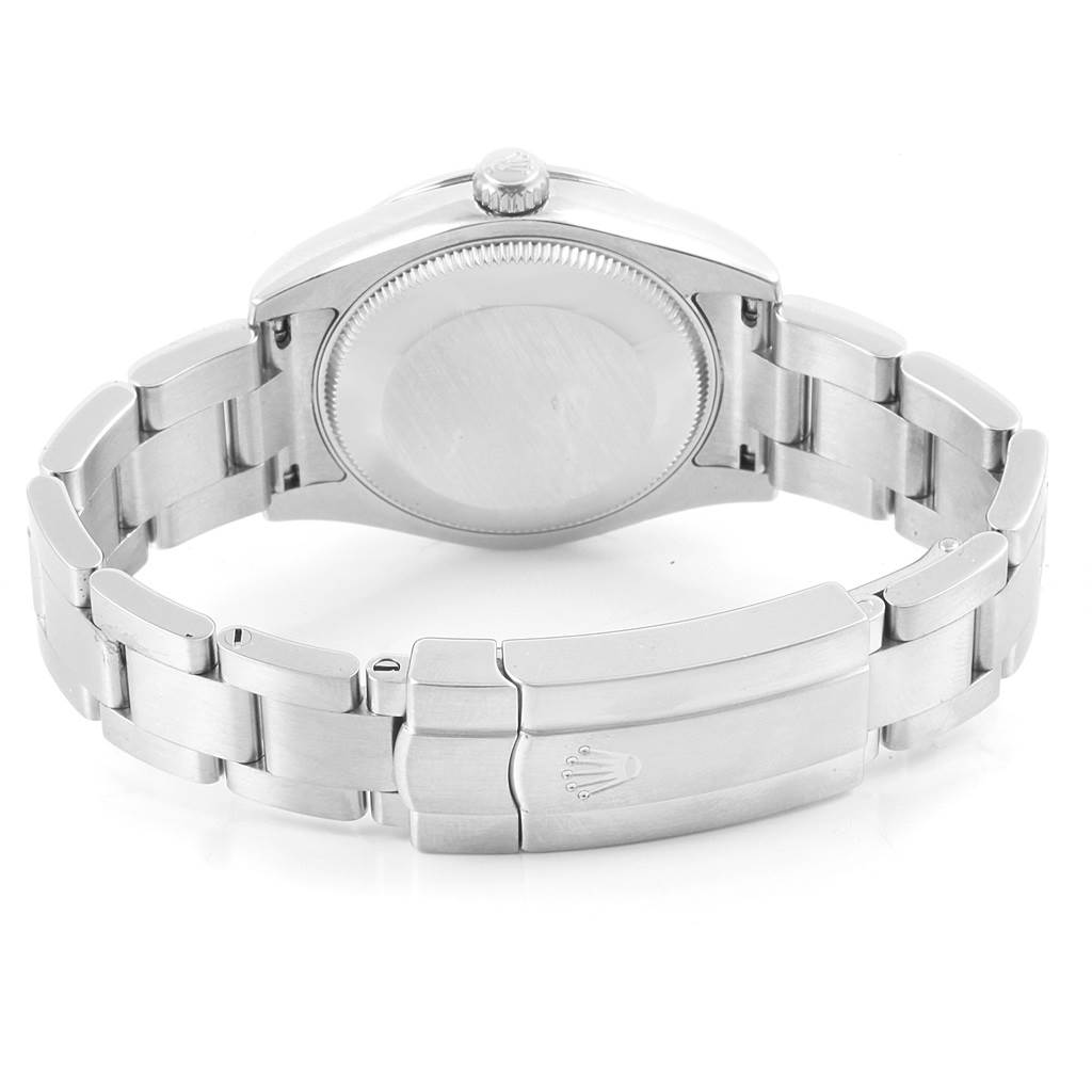 This image shows the back case and metal bracelet of the Rolex Mid-Size 177200 Women's Stainless Steel Black Dial 177200 Women's Stainless Steel Black Dial model watch from a rear angle.