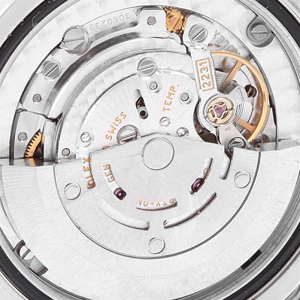 This image shows a close-up view of the movement mechanism of a Mid-Size Rolex watch model.