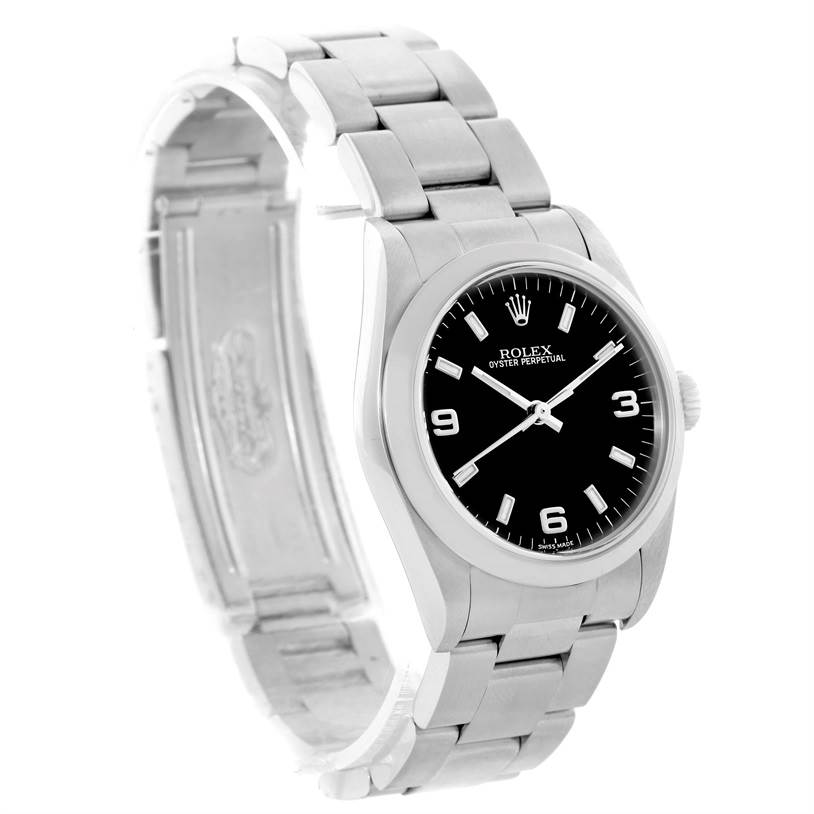 This image shows a side and slightly angled front view of a Rolex Oyster Perpetual Mid-Size watch, highlighting its black dial and stainless steel bracelet.