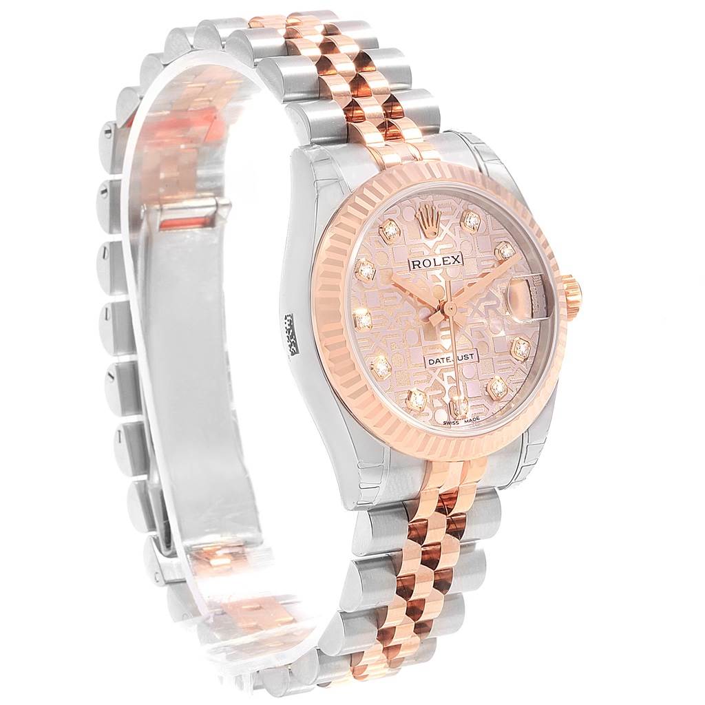 The image shows a side angle of a Rolex Mid-Size 178271 Women's Steel and Gold (two tone) Pink Dial 178271 Women's Steel and Gold (two tone) Pink Dial watch, highlighting its dial, bezel, and bracelet.