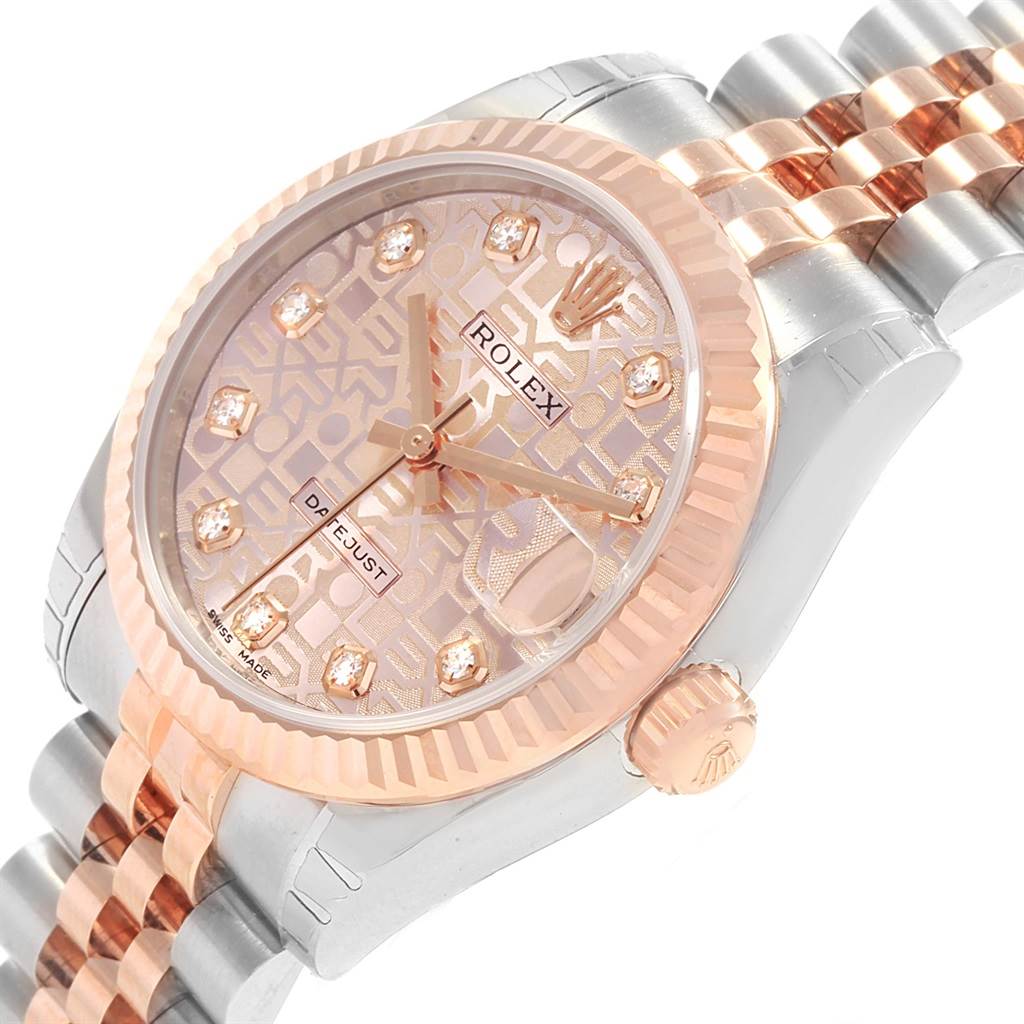 This image shows a close-up angle of the Rolex Mid-Size 178271 Women's Steel and Gold (two tone) Pink Dial 178271 Women's Steel and Gold (two tone) Pink Dial watch, highlighting its dial, bezel, and part of the bracelet.