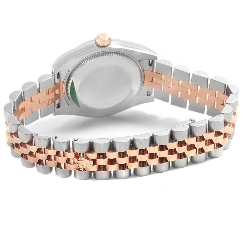 The image shows the back case and bracelet of a Mid-Size Rolex watch, highlighting the two-tone metal design and clasp.