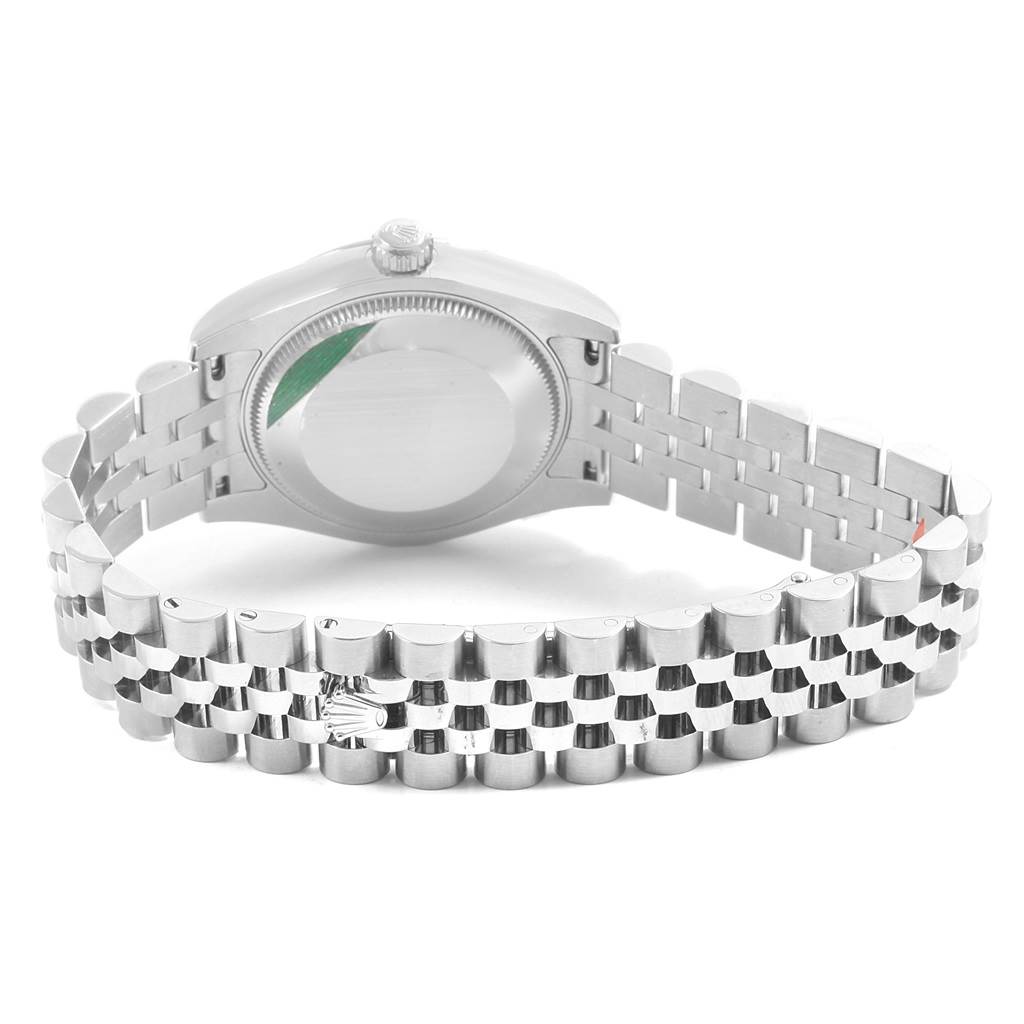 The image shows the back and bracelet of a Mid-Size Rolex watch at a rear angle.