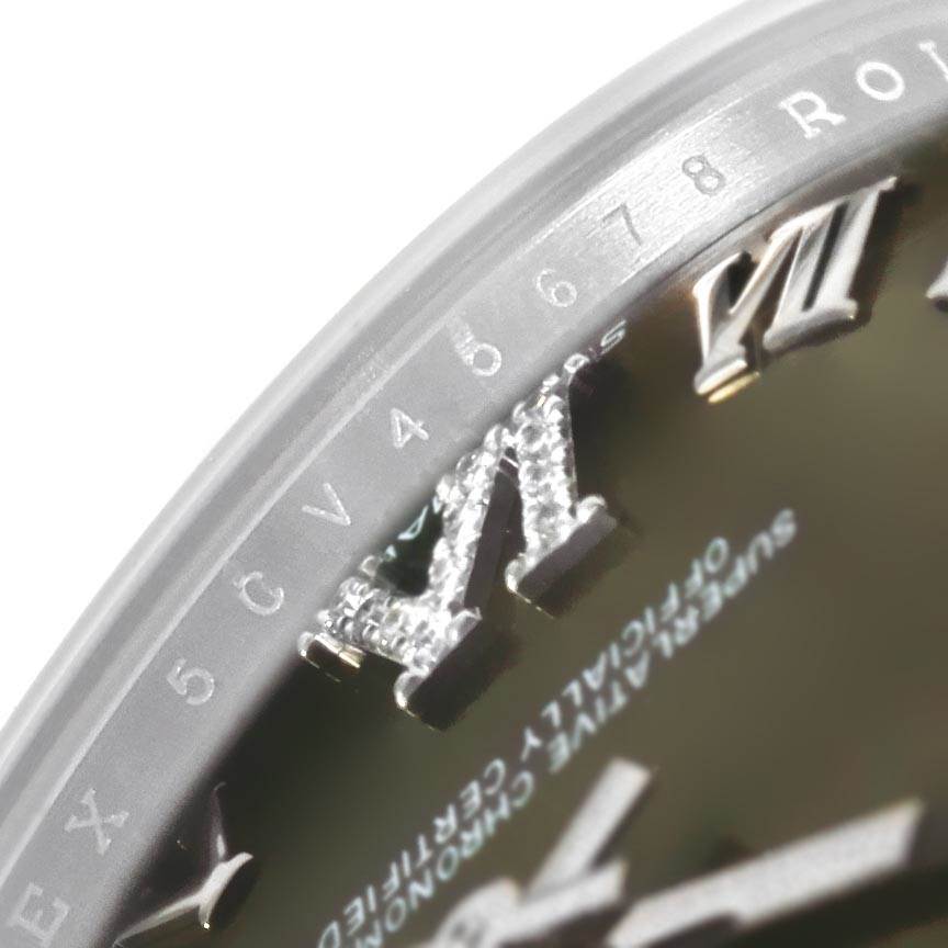 This close-up shows the dial and part of the bezel with branding and index details of the Rolex Mid-Size 178274 Women's Stainless Steel Brown Dial 178274 Women's Stainless Steel Brown Dial model.