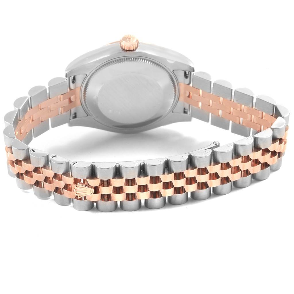 This image shows the back and bracelet of a Mid-Size Rolex watch in a two-tone metal finish.