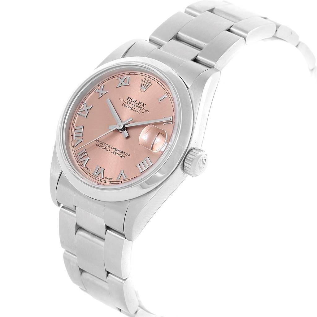 This image shows a side angle of the Rolex 78240 Men's Stainless Steel Pink Dial 78240 Men's Stainless Steel Pink Dial Datejust 31 Midsize Salmon Roman Dial Ladies Watch 78240, featuring the face, bezel, crown, and part of the bracelet.