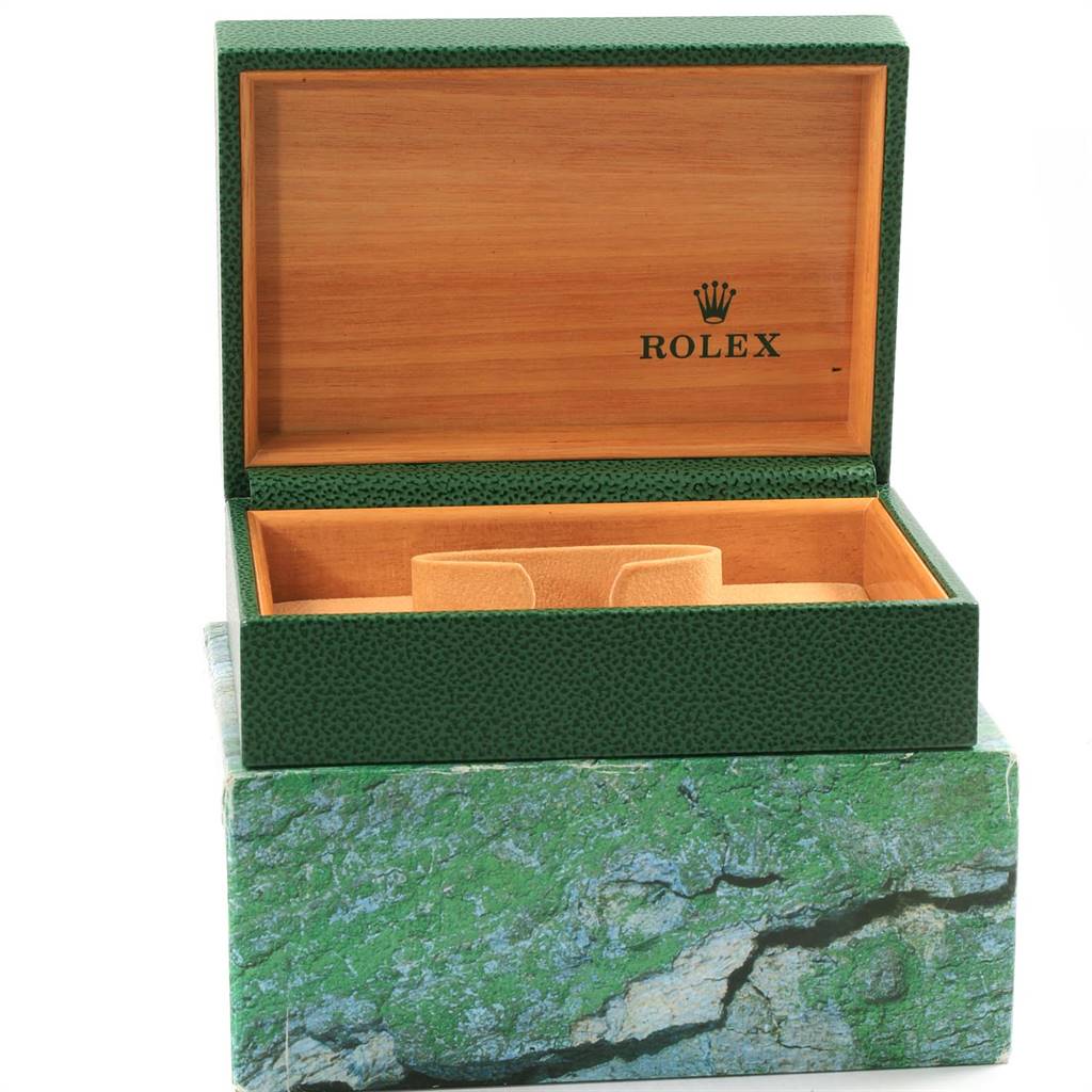 The image shows an open green and wooden Rolex watch box, likely for a Mid-Size model, with the brand logo inside.