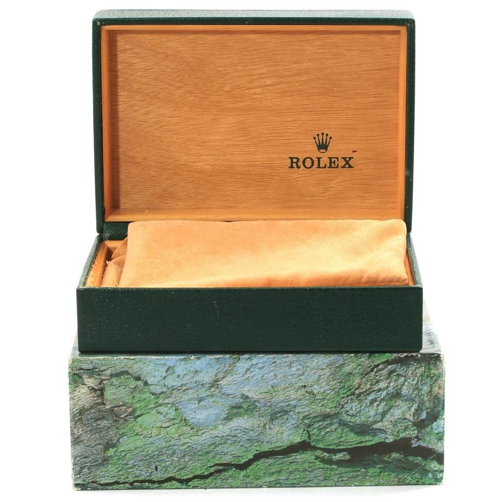 The image shows an open Rolex watch box with a cushion inside, used for the Mid-Size model.