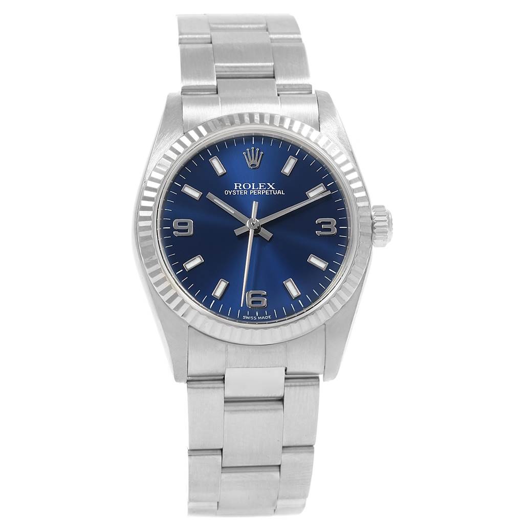 This image shows a front view of a Rolex Mid-Size 77014 Women's Stainless Steel Blue Dial 77014 Women's Stainless Steel Blue Dial Oyster Perpetual watch displaying its face, bezel, crown, and bracelet.