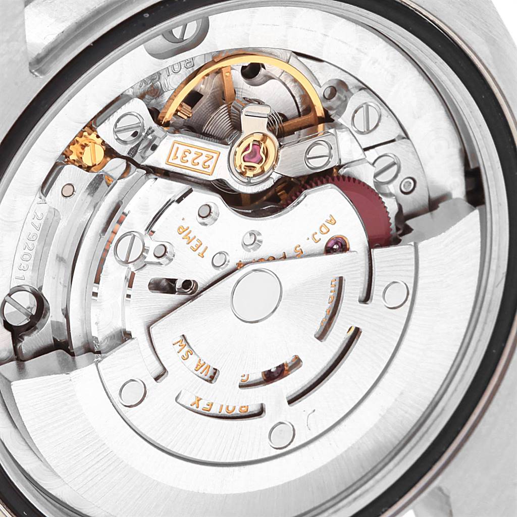 This image shows a close-up of the movement and internal mechanisms of a Rolex Mid-Size 177200 Women's Stainless Steel Grey Dial 177200 Women's Stainless Steel Grey Dial model watch.