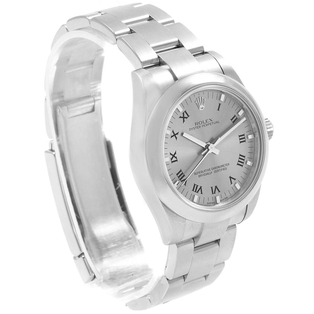 The image shows a side angle of a Rolex Mid-Size 177200 Women's Stainless Steel Grey Dial 177200 Women's Stainless Steel Grey Dial watch, highlighting its silver bracelet, clasp, and face with Roman numeral markers.