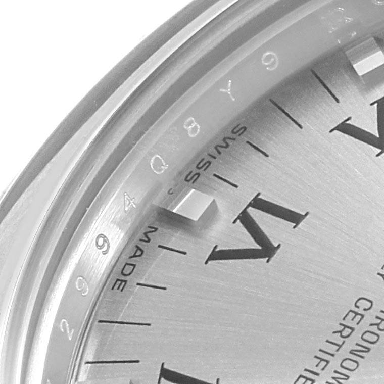 This image shows a close-up of the dial and bezel of a Rolex Mid-Size 177200 Women's Stainless Steel Grey Dial 177200 Women's Stainless Steel Grey Dial model watch.