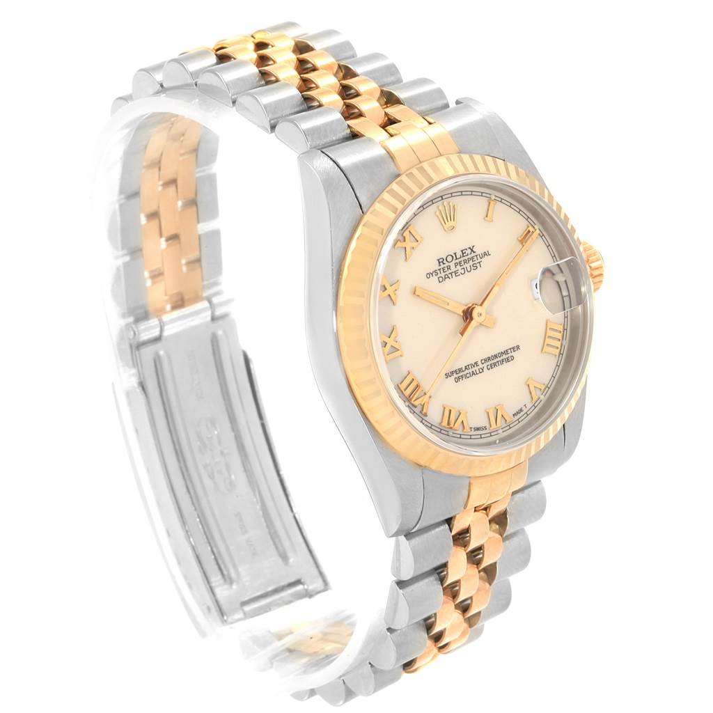 This Rolex Mid-Size 68273 Women's Steel and Gold (two tone) Beige Dial 68273 Women's Steel and Gold (two tone) Beige Dial watch, shown at a three-quarter angle, features a bi-metal bracelet, a fluted bezel, and a date window on the dial.