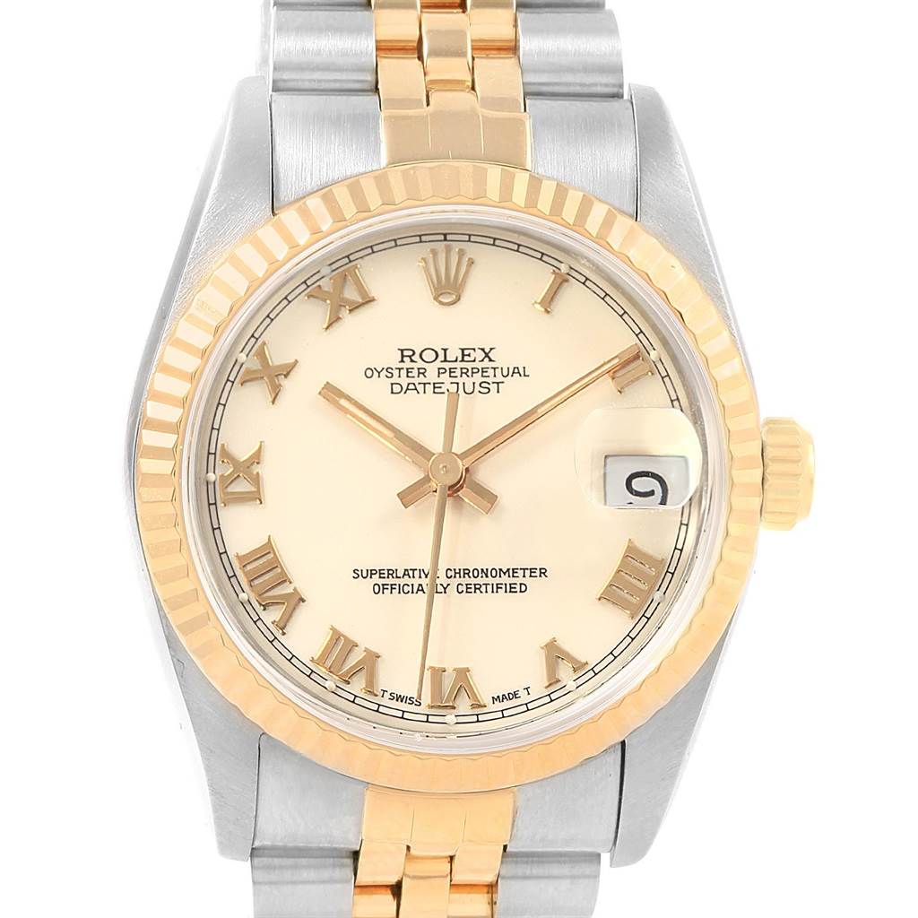 This image shows a front view of a Rolex Mid-Size 68273 Women's Steel and Gold (two tone) Beige Dial 68273 Women's Steel and Gold (two tone) Beige Dial Datejust, highlighting the dial, bezel, and part of the bracelet.