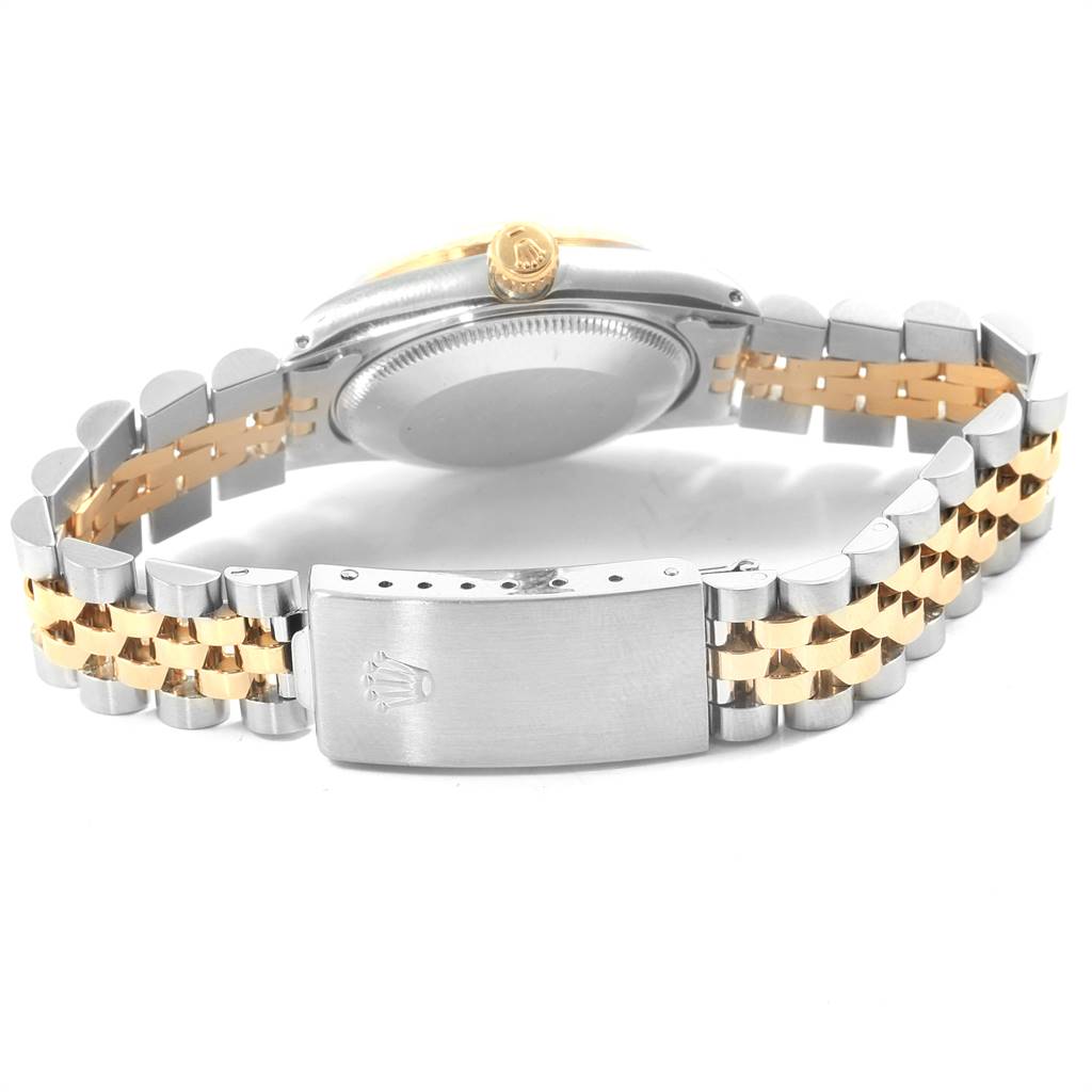 The image shows the backside and bracelet of a Rolex Mid-Size 68273 Women's Steel and Gold (two tone) Champagne Dial 68273 Women's Steel and Gold (two tone) Champagne Dial model, focusing on the clasp and crown.