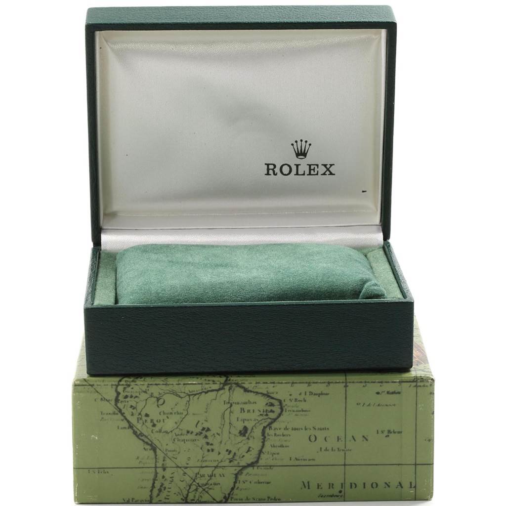 This image shows an open Rolex watch box for a Mid-Size model, displaying the interior with a green cushion.