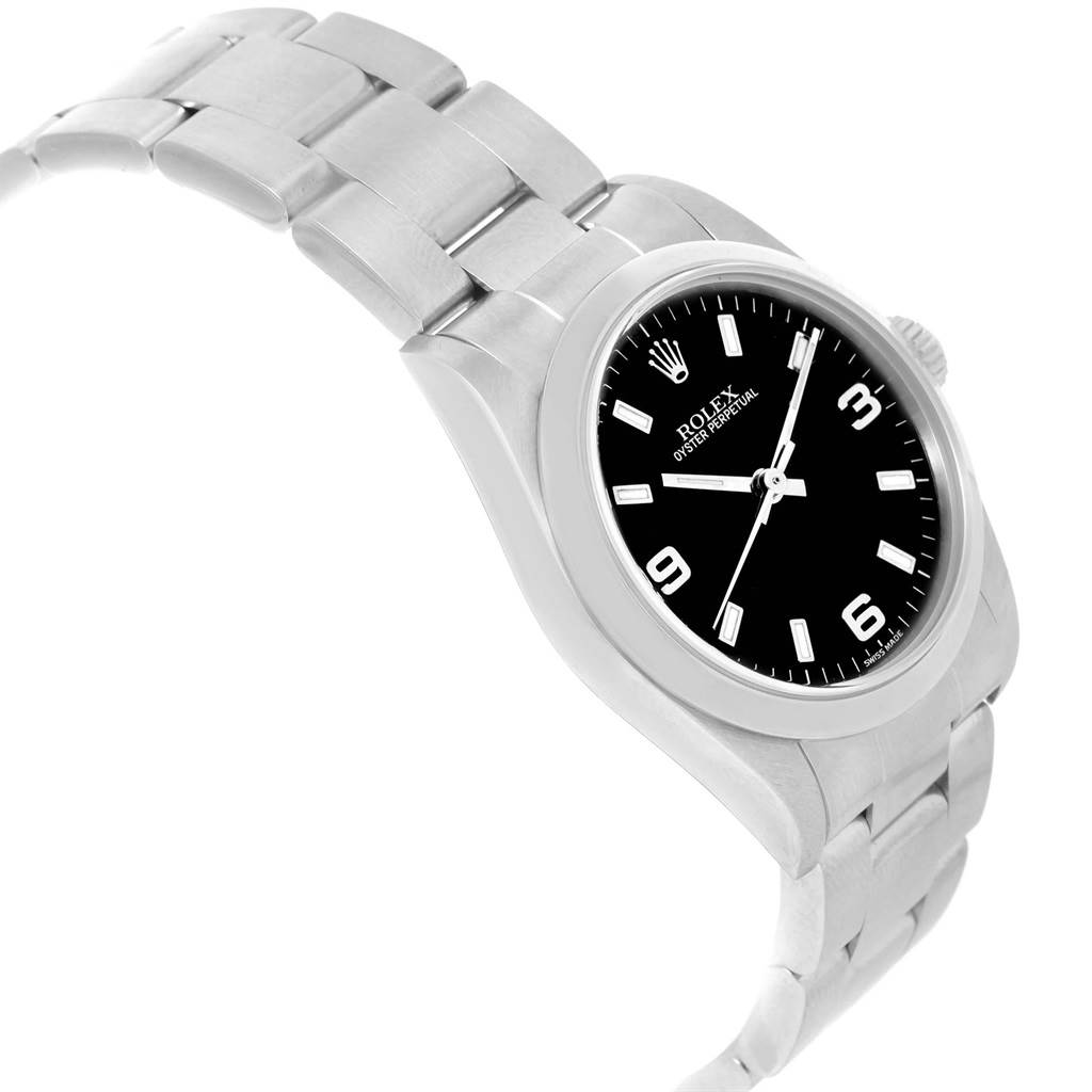 This image shows the front and side view of a Rolex Oyster Perpetual Mid-Size model, displaying the black dial and stainless steel bracelet.