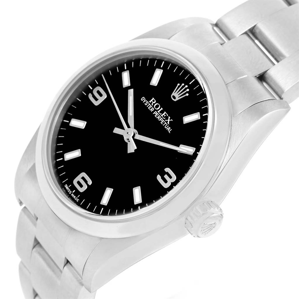 This image shows a close-up of the Rolex Mid-Size 77080 Women's Stainless Steel Black Dial 77080 Women's Stainless Steel Black Dial Oyster Perpetual watch, highlighting the dial, bezel, clasp, and crown.