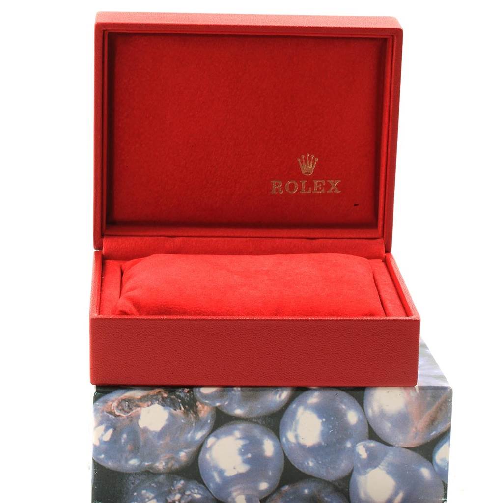 The image shows an open red Rolex watch box for a Mid-Size model, displaying the interior pillow and lining.