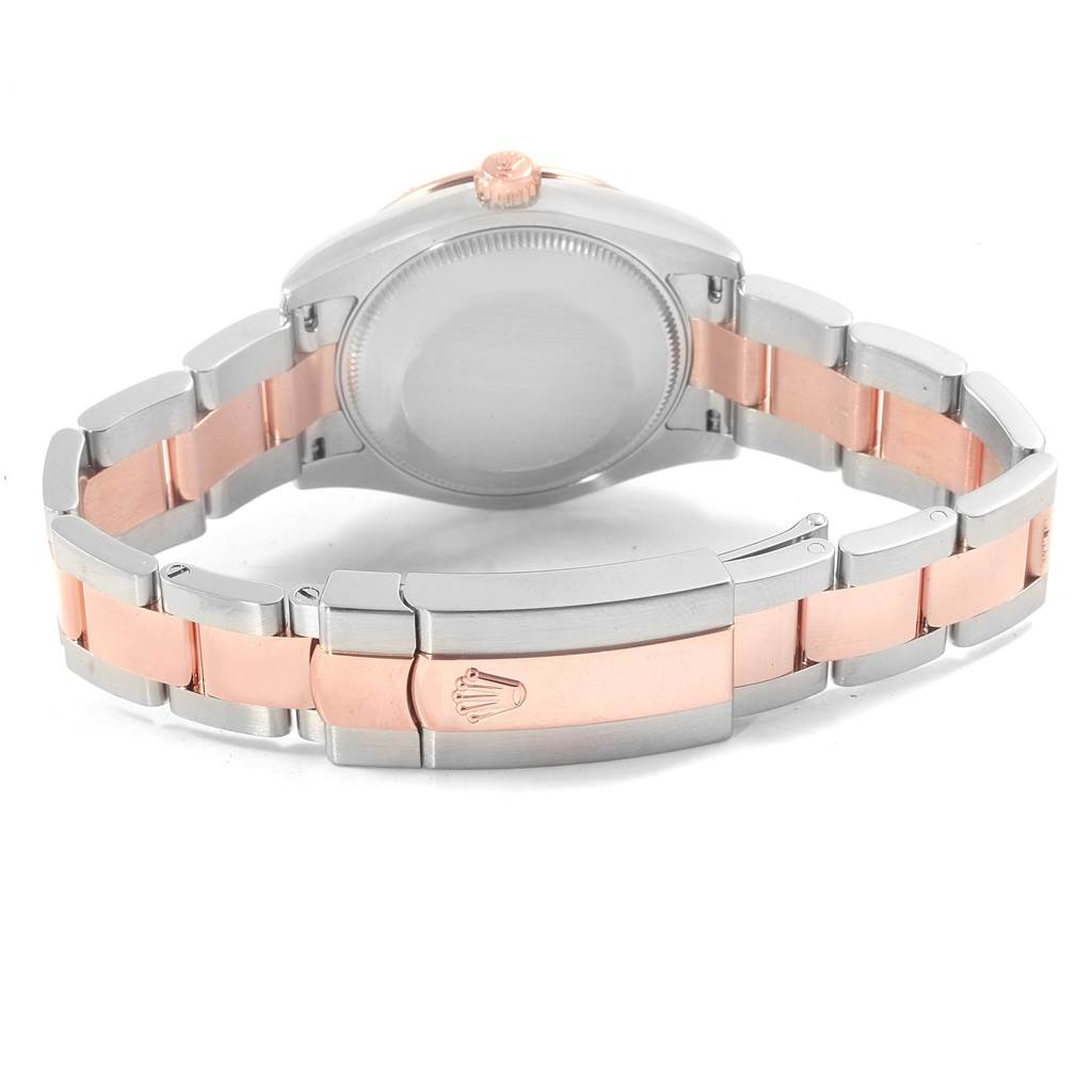 The image shows the back and bracelet of a Rolex Mid-Size 178341 Women's Steel and Gold (two tone) Pink Dial 178341 Women's Steel and Gold (two tone) Pink Dial model, highlighting its stainless steel and rose gold links.