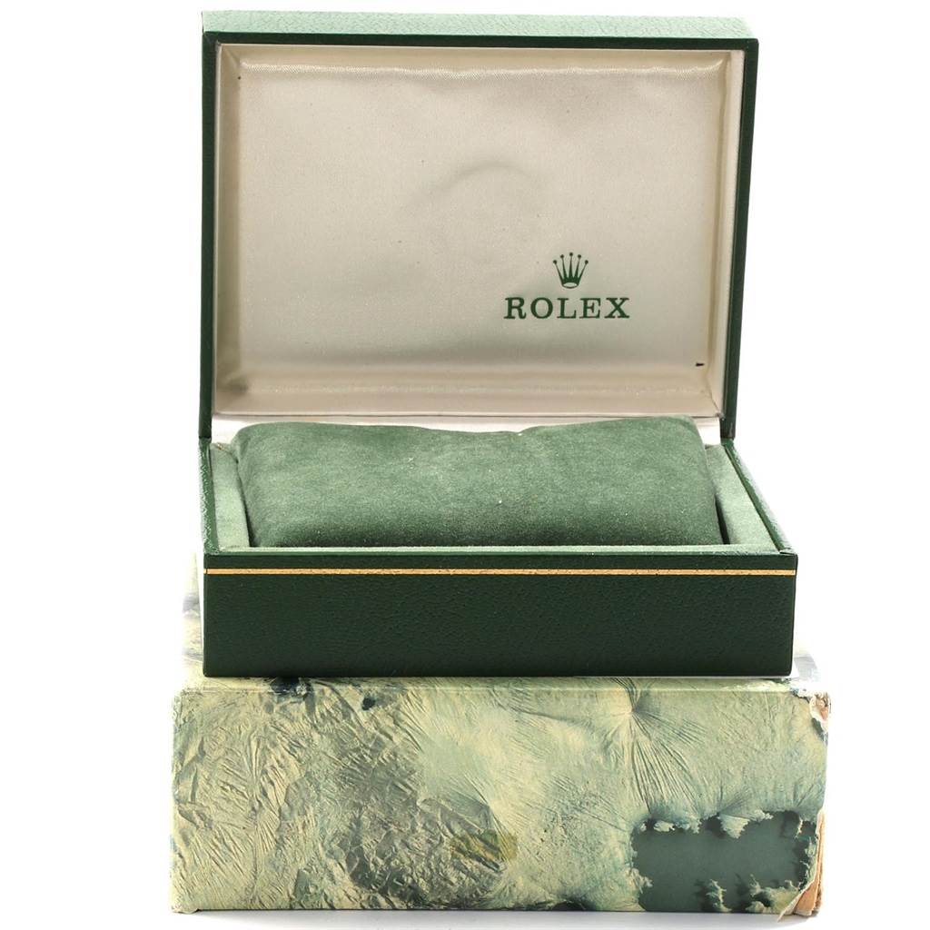 The image shows an open Rolex watch box for a Mid-Size model, displaying the interior padding and the Rolex logo on the lid.