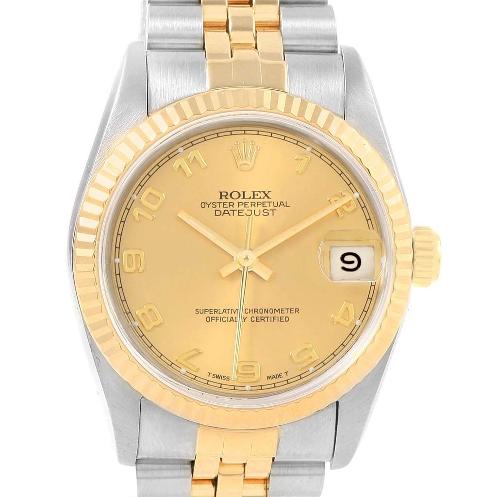 This image shows a Rolex Mid-Size 68273 Women's Steel and Gold (two tone) Champagne Dial 68273 Women's Steel and Gold (two tone) Champagne Dial Datejust watch from the front, highlighting the dial, bezel, crown, and part of the bracelet.