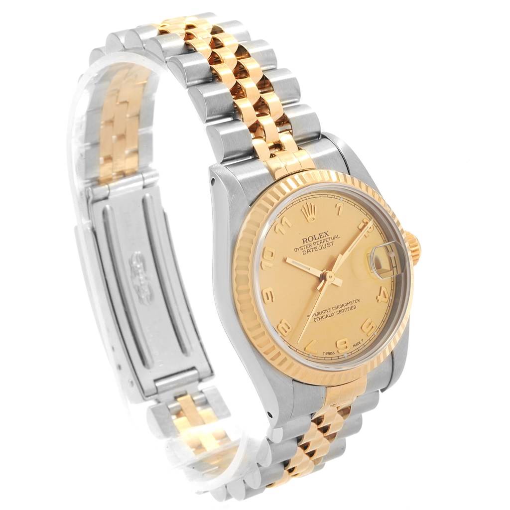 The Rolex Mid-Size 68273 Women's Steel and Gold (two tone) Champagne Dial 68273 Women's Steel and Gold (two tone) Champagne Dial watch is shown at a three-quarter angle, highlighting its face, bracelet, fluted bezel, and crown.
