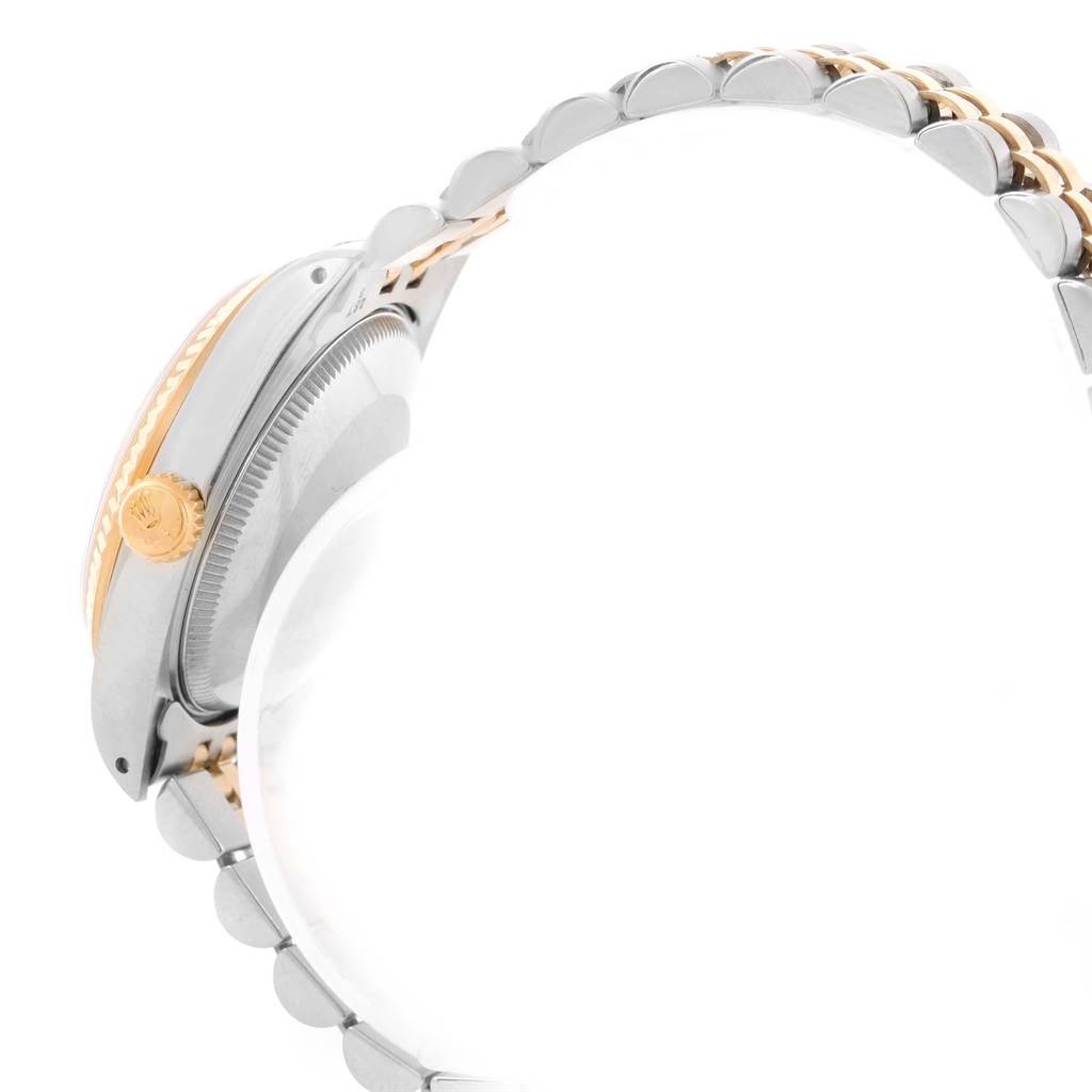 The image shows a side view of a Rolex Mid-Size 68273 Women's Steel and Gold (two tone) Champagne Dial 68273 Women's Steel and Gold (two tone) Champagne Dial watch, highlighting the crown, bezel, and part of the bracelet.