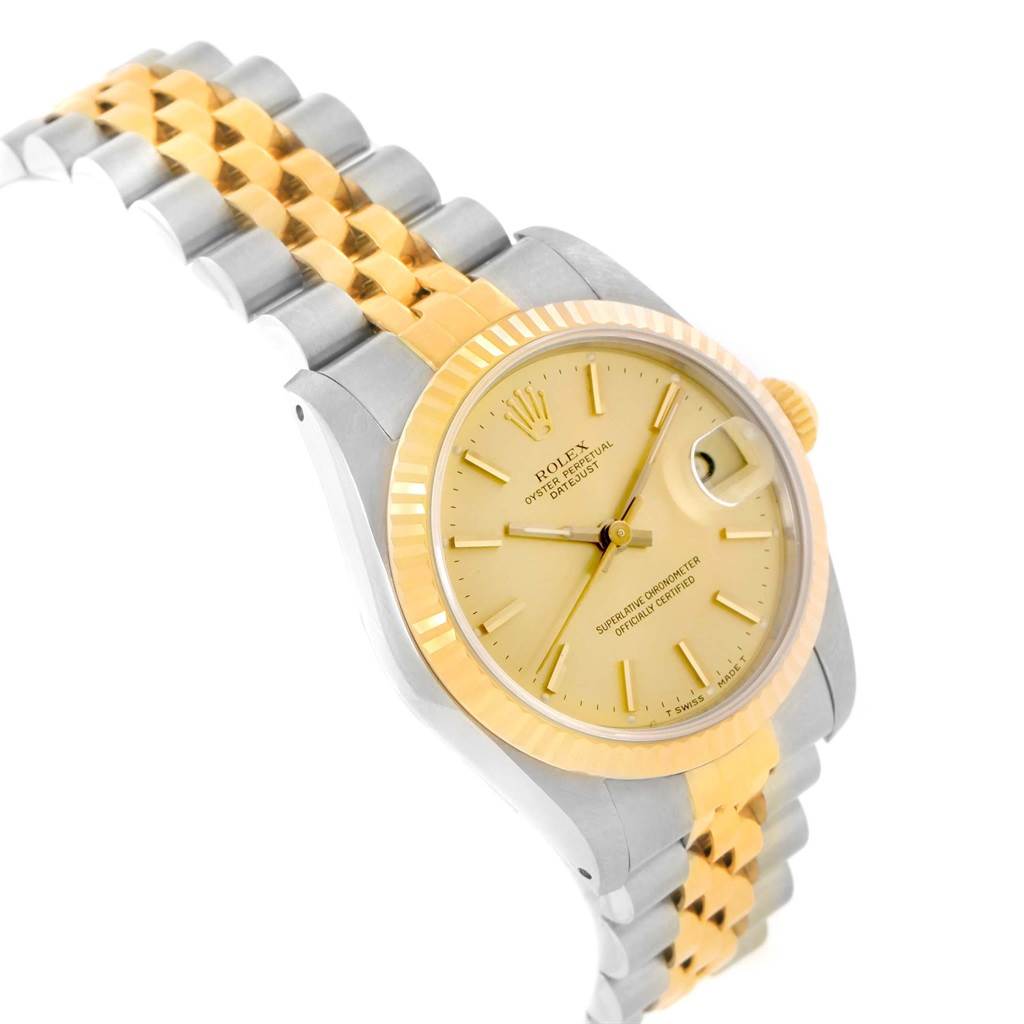 The Rolex Mid-Size 68273 Women's Steel and Gold (two tone) Champagne Dial 68273 Women's Steel and Gold (two tone) Champagne Dial watch is shown at an angle displaying the face, bracelet, bezel, crown, and part of the case.