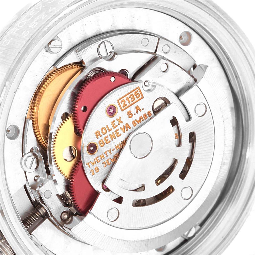 The image shows the internal mechanism and movement of a Rolex Mid-Size 68240 Women's Stainless Steel White Dial 68240 Women's Stainless Steel White Dial model.