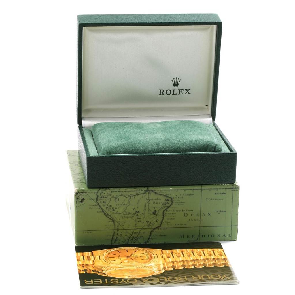 The image shows a Rolex Mid-Size 68273 Women's Steel and Gold (two tone) Champagne Dial 68273 Women's Steel and Gold (two tone) Champagne Dial model watch box and an accompanying manual, viewed from the front.