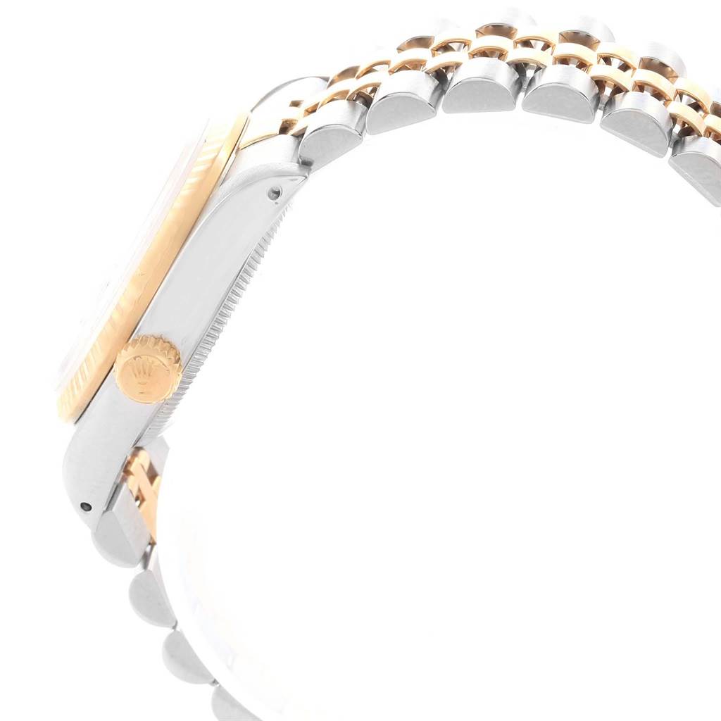 This image shows a side view of the case, crown, and part of the bracelet of a Mid-Size Rolex watch.