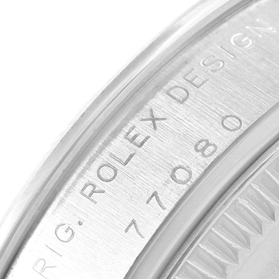This image shows a close-up angle of the case side of the Mid-Size Rolex watch, highlighting the "ROLEX DESIGN" and model number engraving.