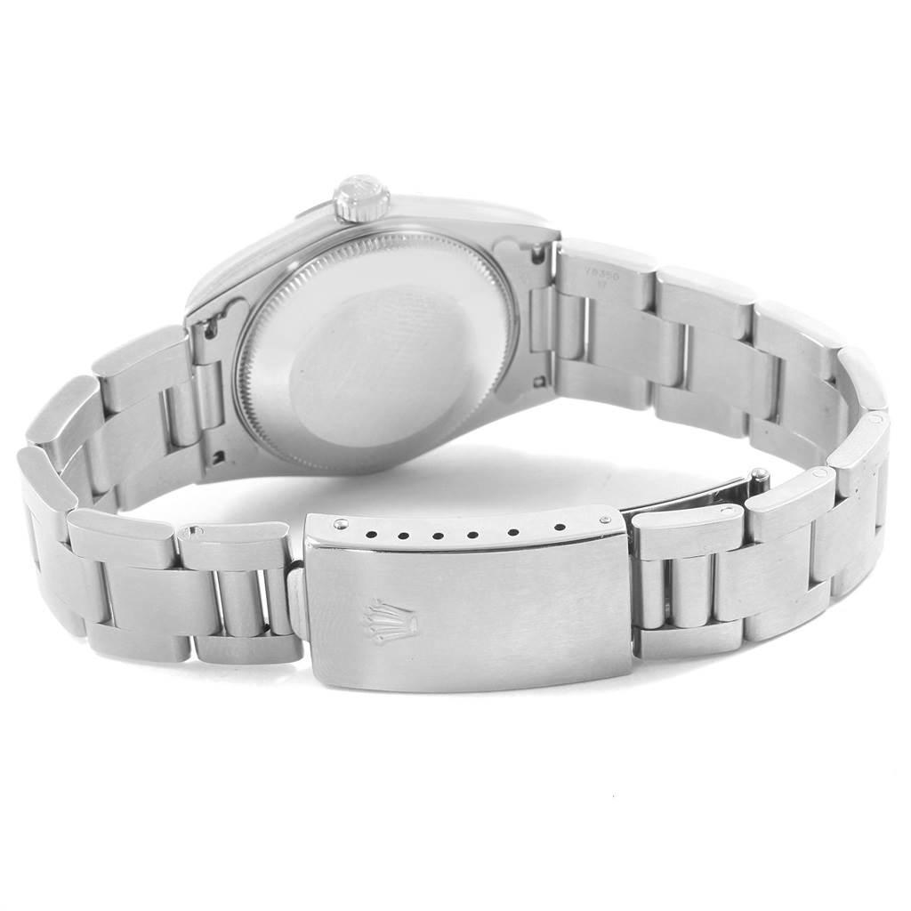 The image shows the back case, clasp, and bracelet of a Mid-Size Rolex watch from a slightly angled rear view.