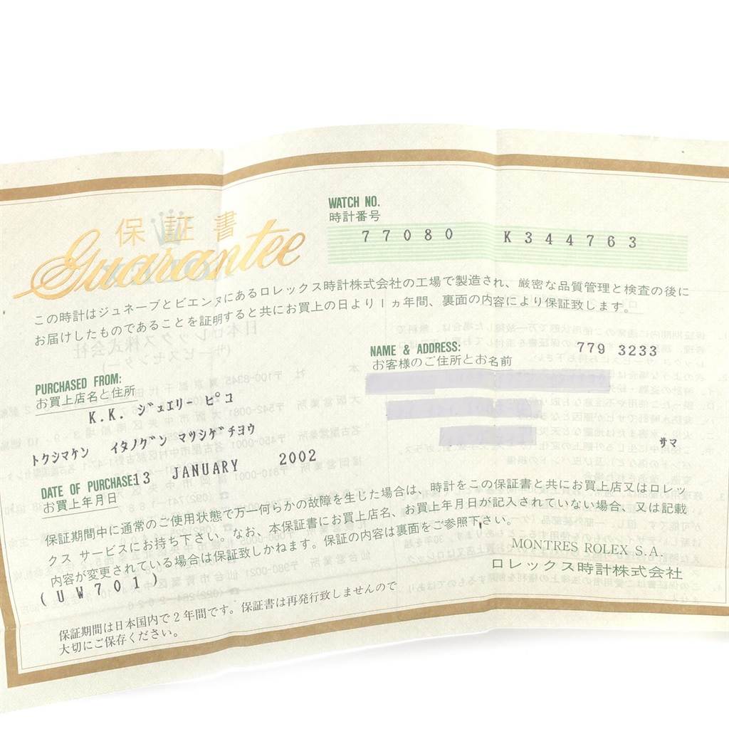 The image shows a guarantee certificate for a Mid-Size Rolex watch, with details like watch number and purchase date.