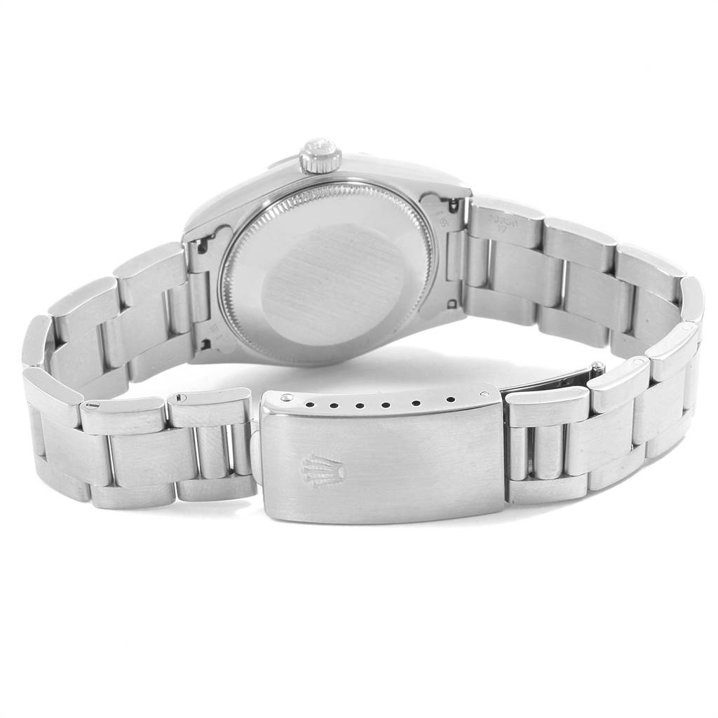 The image shows the back view of a Rolex Mid-Size 68240 Women's Stainless Steel White Dial 68240 Women's Stainless Steel White Dial watch with its case back and bracelet visible.