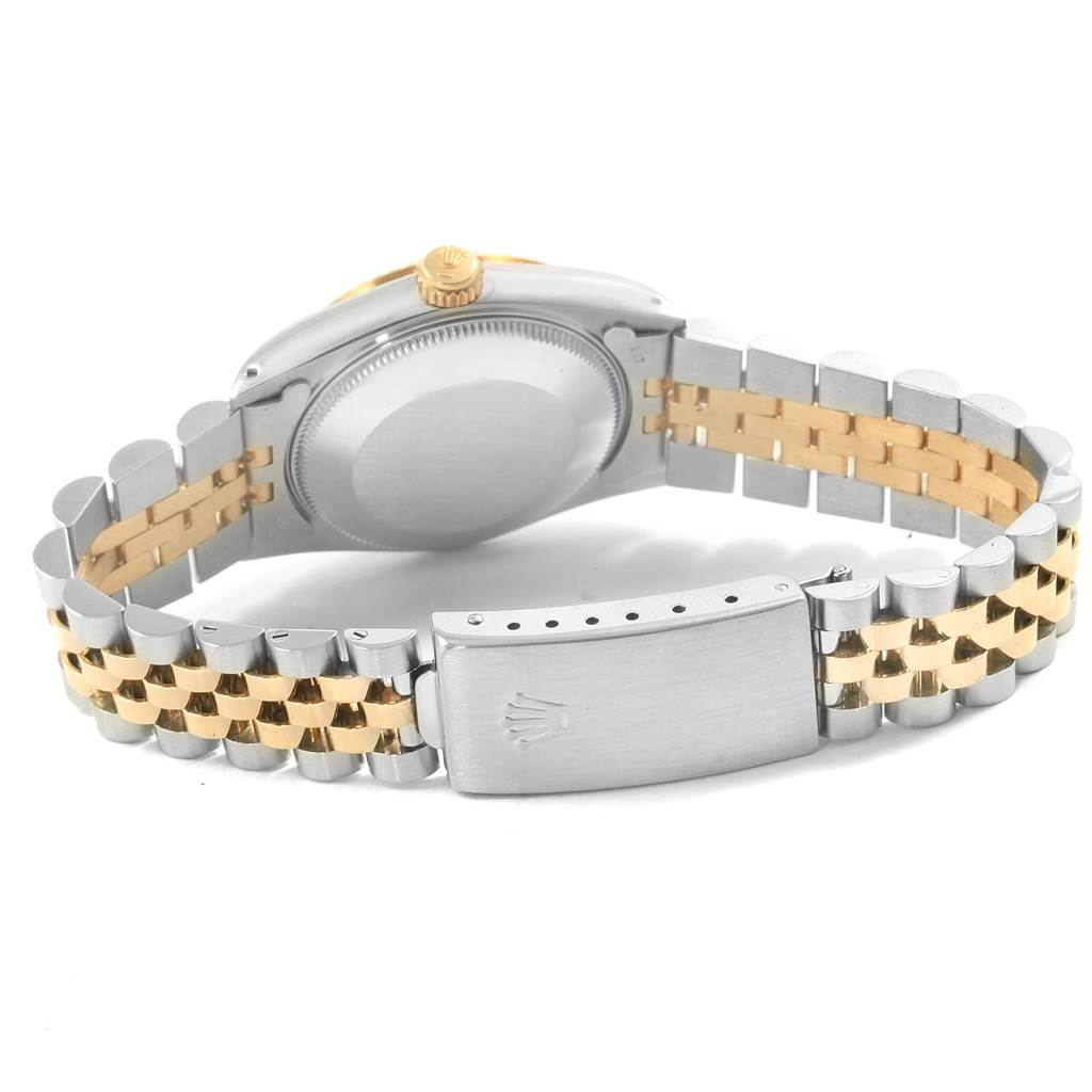 This image shows the back case and two-tone jubilee bracelet with a clasp of a Rolex Mid-Size 68273 Women
s Steel and Gold (two tone) Beige Dial 68273 Women
s Steel and Gold (two tone) Beige Dial model watch.