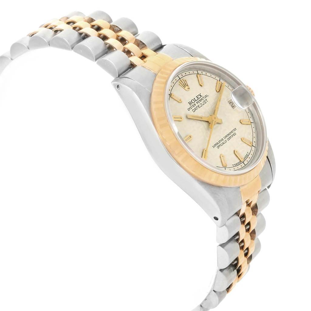 The image shows a side view of the Mid-Size Rolex watch, highlighting its two-tone band, dial, and fluted bezel.