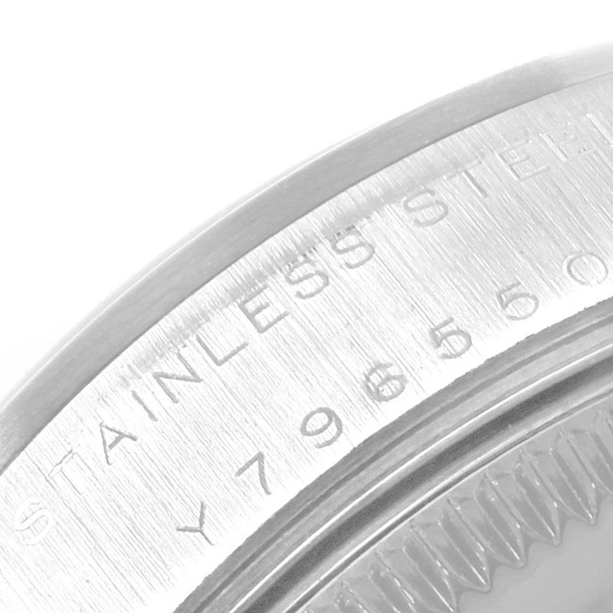 This image shows the stainless steel caseback engraving of a Mid-Size Rolex watch.